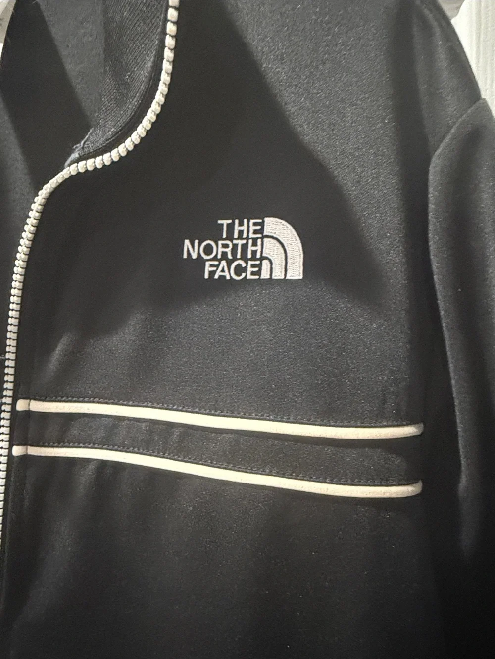 The North Face Black Track Jacket with White Accents